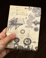 Engineering mini hardcover notebook by Cognitive Surplus, pictured in hand